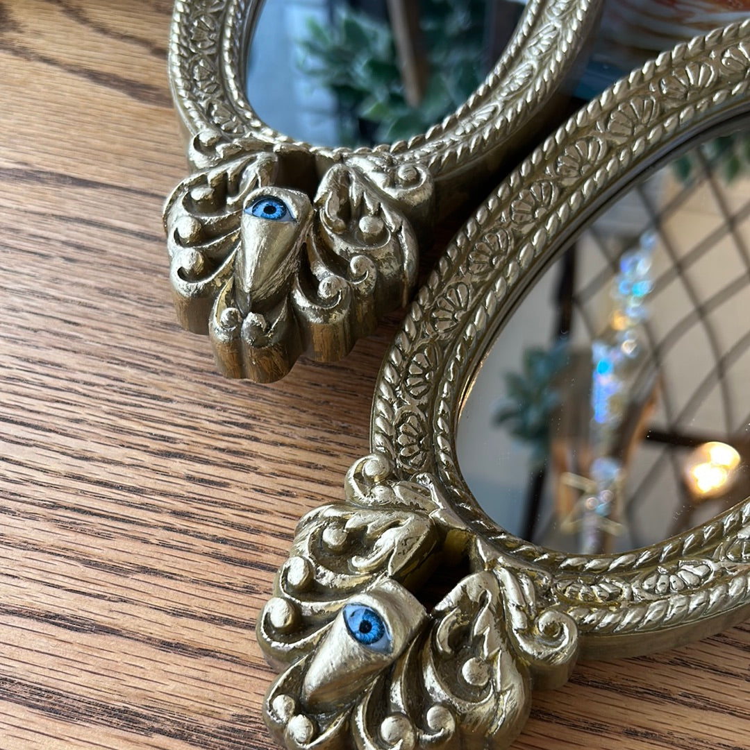 Vintage mirror with hidden eye!