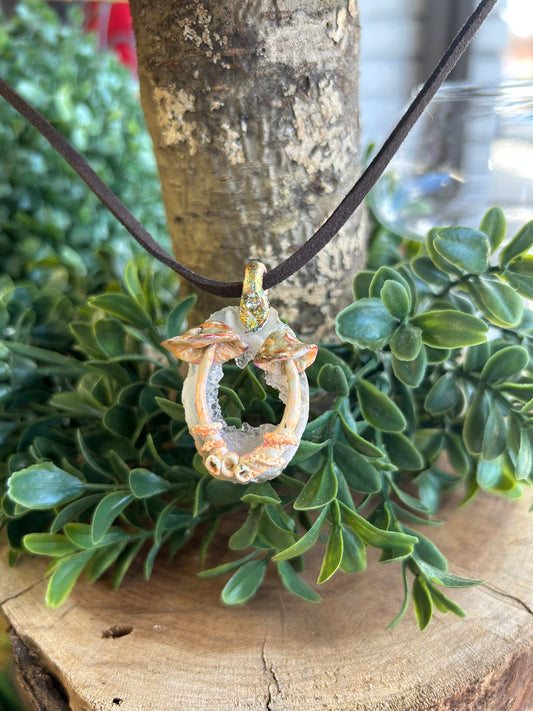 Hand sculpted mushroom/ natural geode slice pendant on brown cording